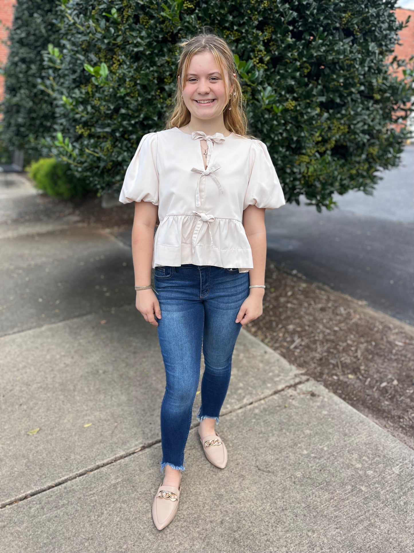 Cream Peplum Top with Bows