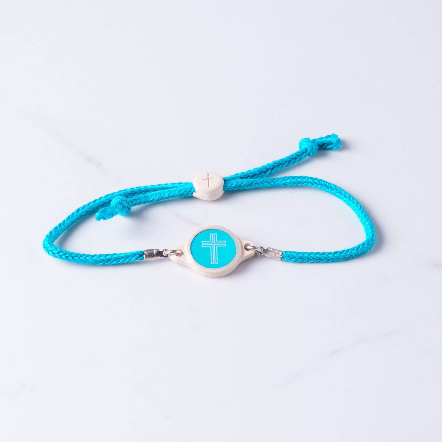 Tap To Pray™ - Survivor Series Handmade Bracelets: Turquoise + Cross