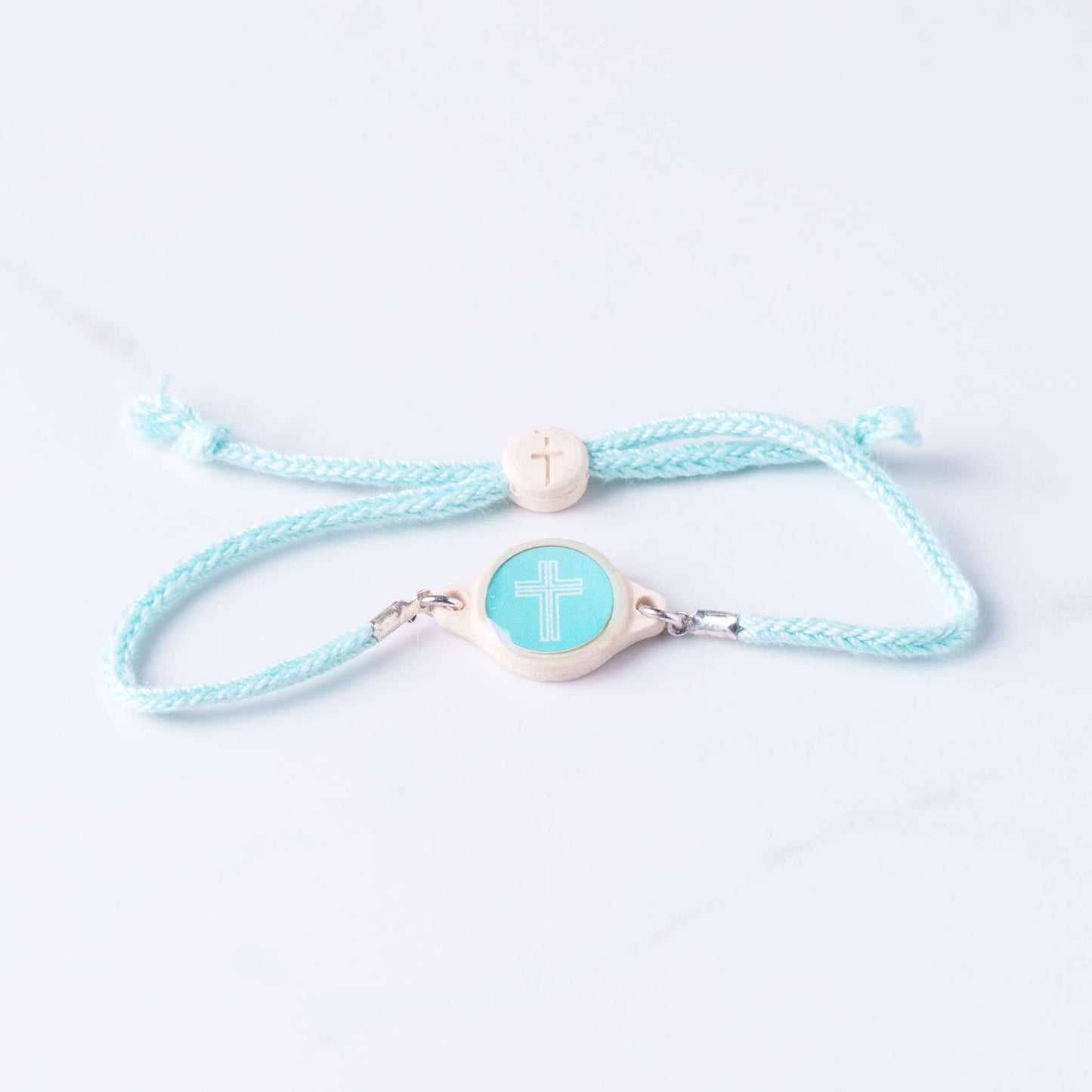 Tap To Pray™ - Survivor Series Handmade Bracelets: Coral + Cross