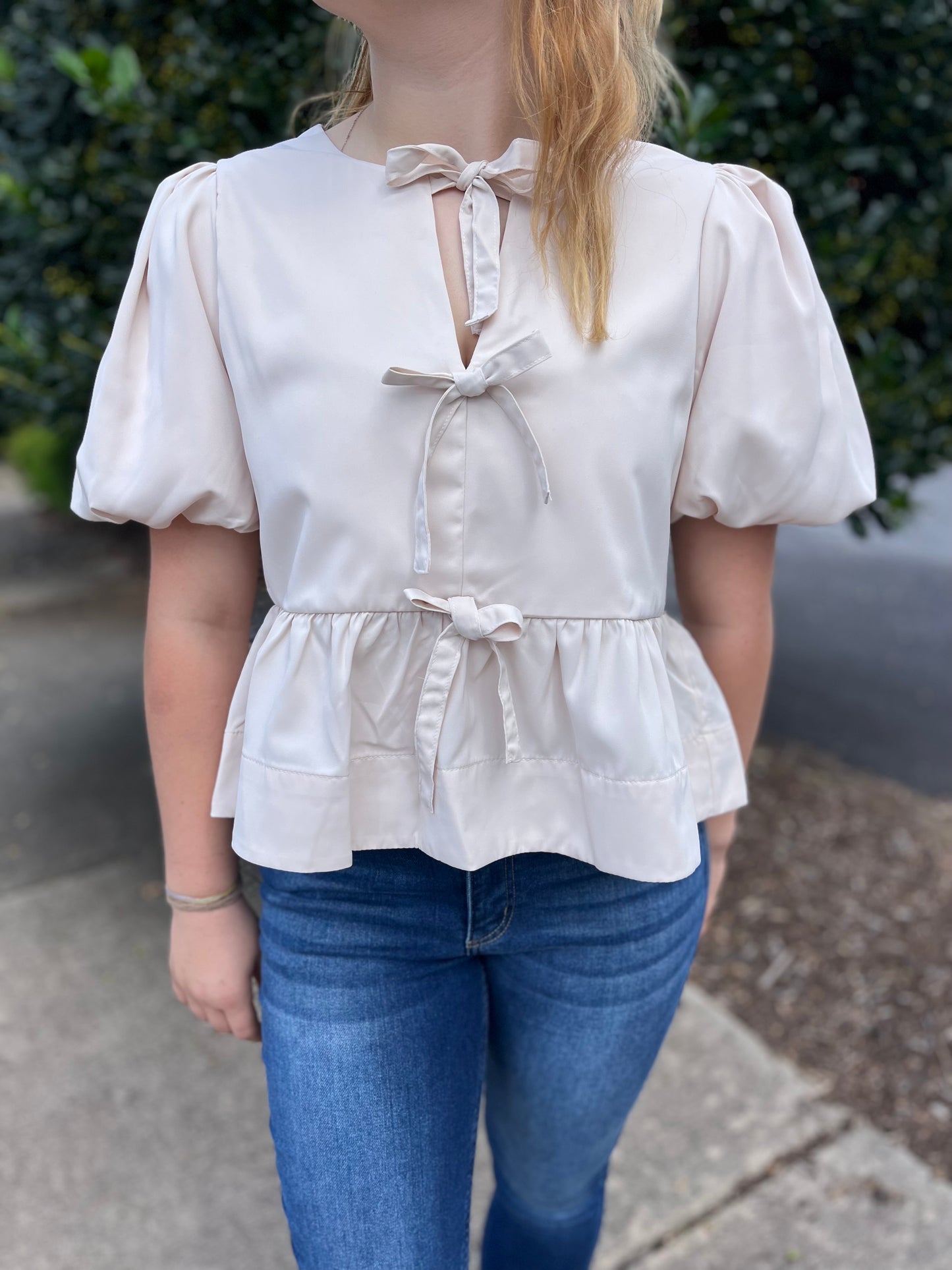 Cream Peplum Top with Bows